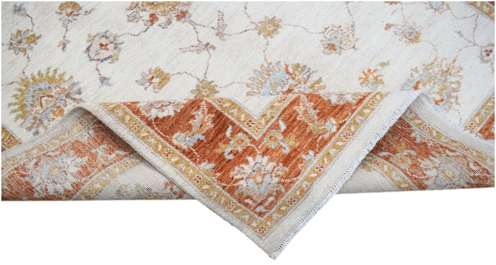 A handwoven Afghan Chobi rug with a cream field and a rust-colored floral border.