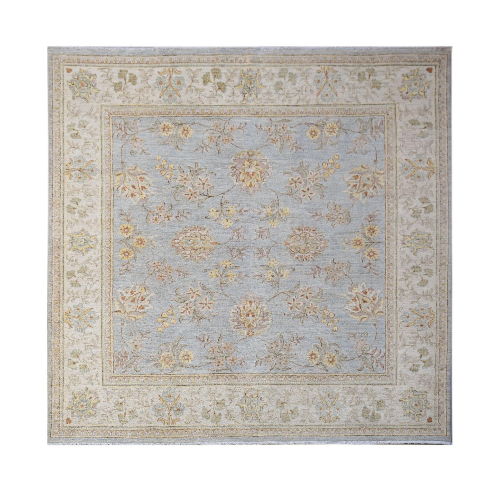 A square Afghan Chobi rug featuring a light blue field with traditional floral patterns.