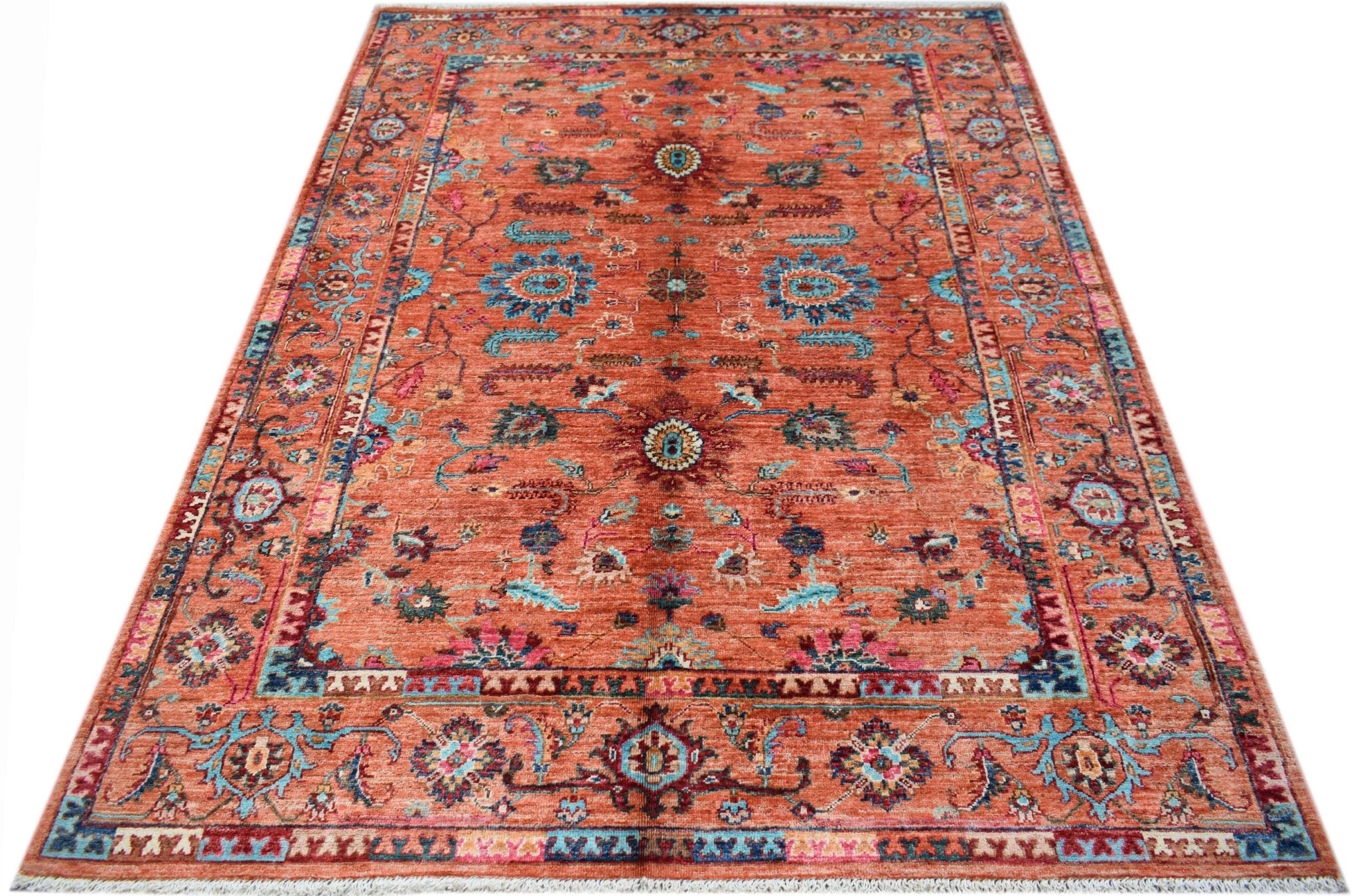 A rectangular Afghan Chobi rug featuring a traditional floral pattern in shades of orange and blue.