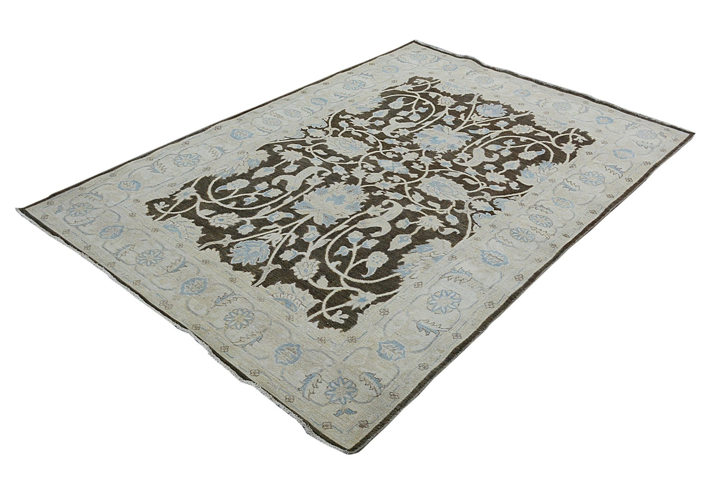 A handmade Afghan Chobi rug featuring a dark brown floral pattern on a light beige background.