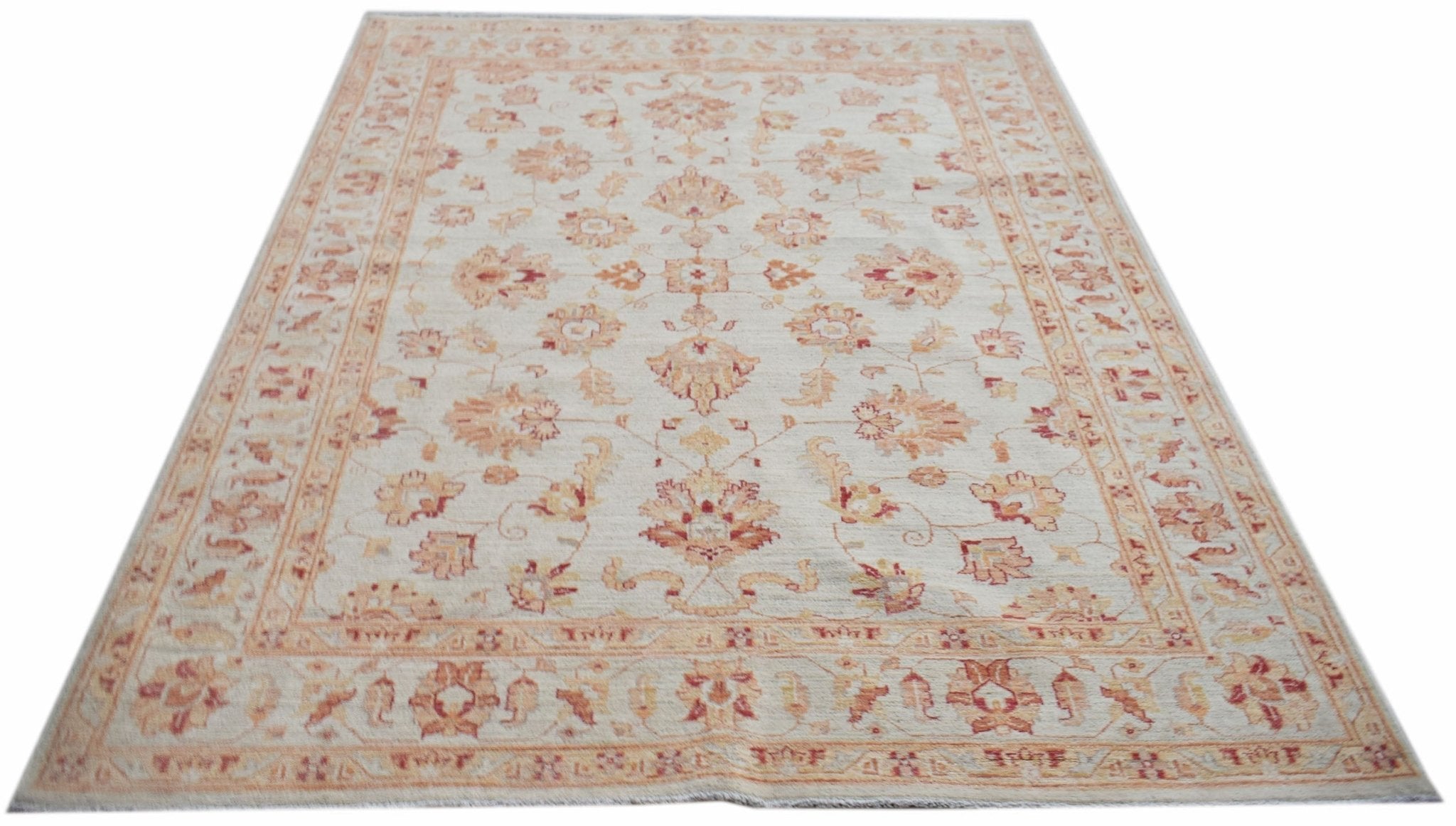 A rectangular Afghan Chobi rug featuring a traditional floral pattern in soft earth tones.