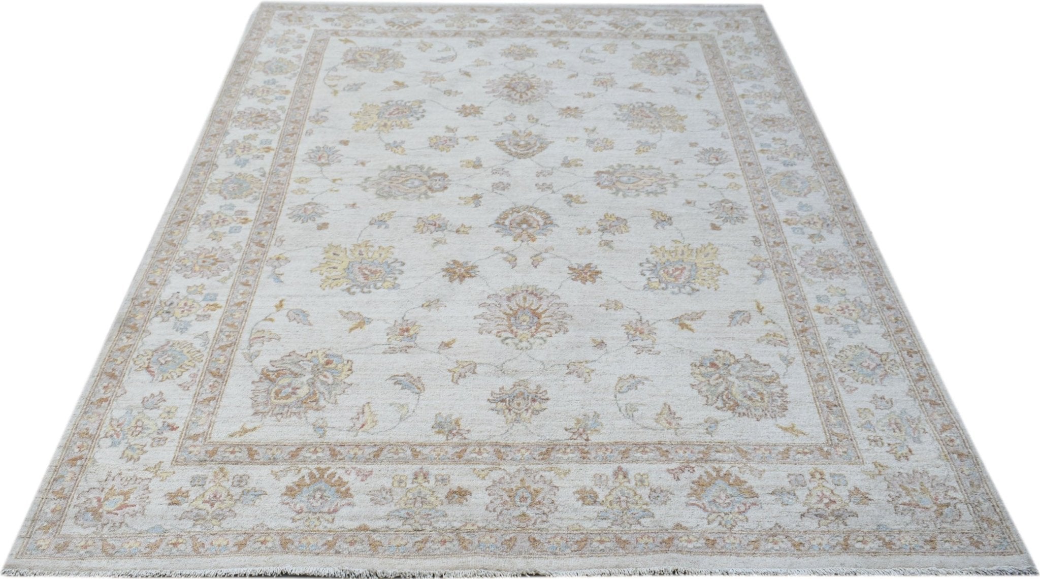 A rectangular Afghan Chobi rug featuring a traditional floral pattern in soft, earthy tones.