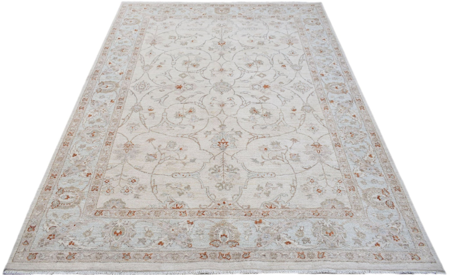 A handmade Afghan Chobi rug featuring a traditional floral pattern in soft beige and rust tones.