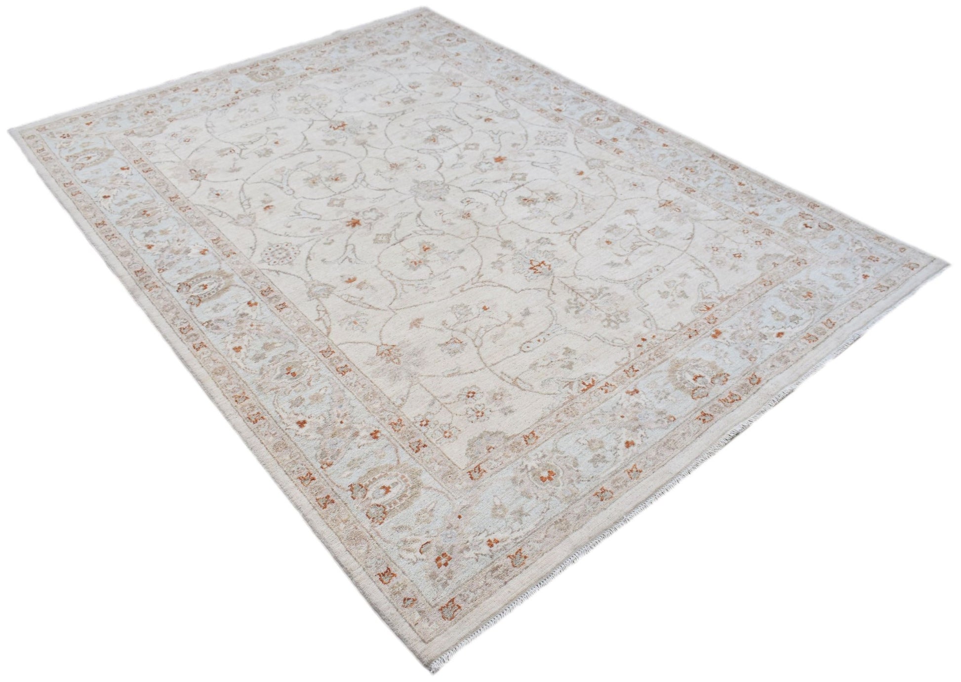 An Afghan Chobi rug featuring a traditional floral pattern in soft beige and muted orange tones.