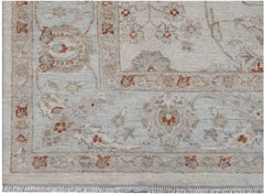 A handwoven Afghan Chobi rug featuring a traditional floral pattern in soft earth tones.