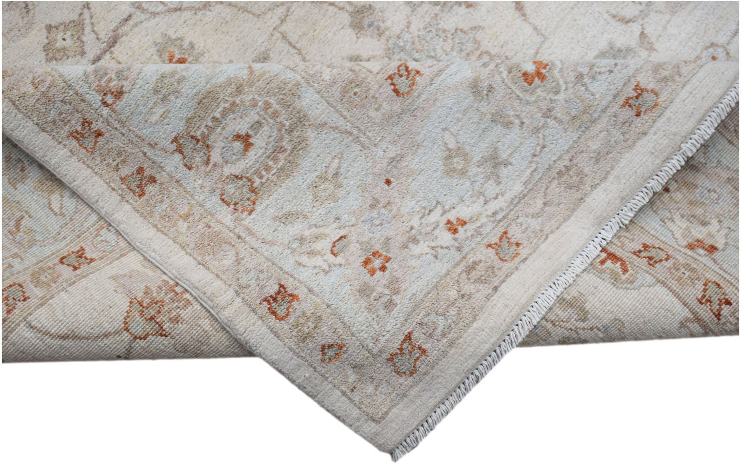 A handwoven Afghan Chobi rug featuring a traditional floral pattern in soft beige and orange tones.