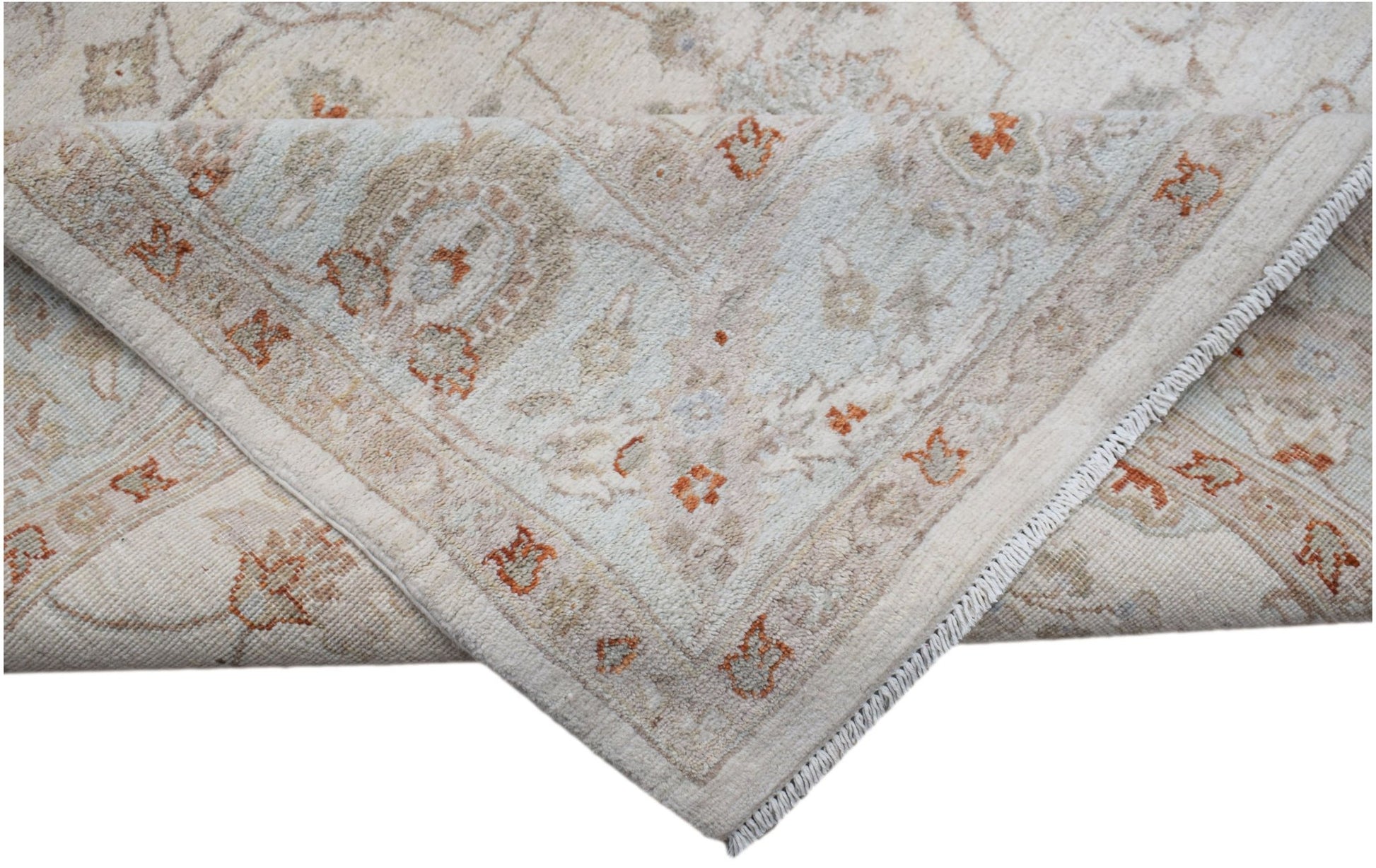 A handwoven Afghan Chobi rug featuring a traditional floral pattern in soft beige and orange tones.