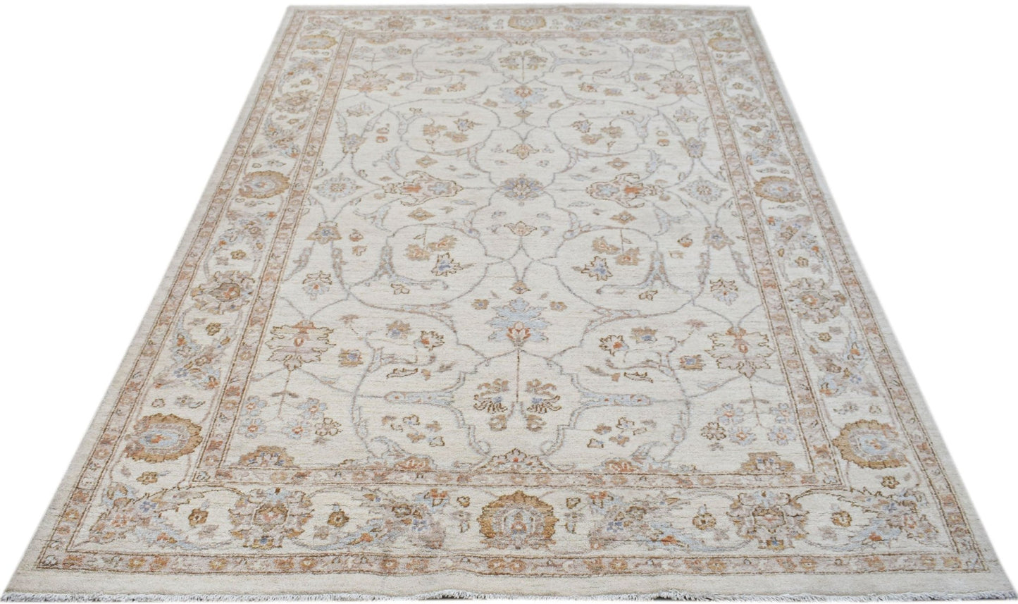 An Afghan Chobi rug featuring a traditional floral pattern in soft beige and earthy tones.