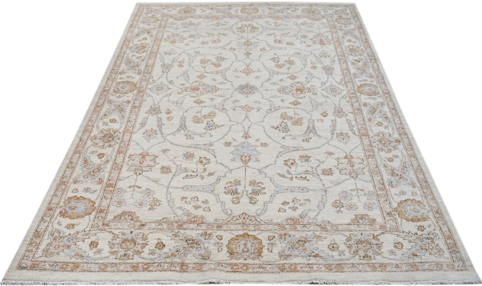 An Afghan Chobi rug featuring a traditional floral pattern in soft beige and earthy tones.