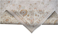 A handwoven Afghan Chobi rug featuring a traditional floral pattern in soft, earthy wood tones.