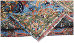A handmade Afghan Chobi rug featuring a traditional floral pattern in blue, green, and rust tones.