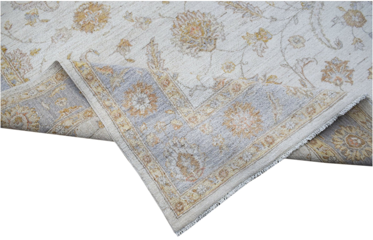 A handwoven Afghan Chobi rug featuring a traditional floral pattern in soft beige and blue tones.