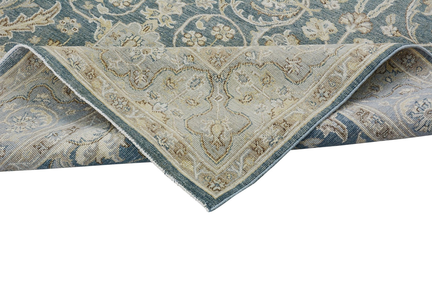A handmade Afghan Chobi rug featuring a traditional floral pattern in blue and beige tones.