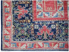 A handwoven Afghan Chobi rug featuring a traditional geometric pattern in red, blue, and cream.
