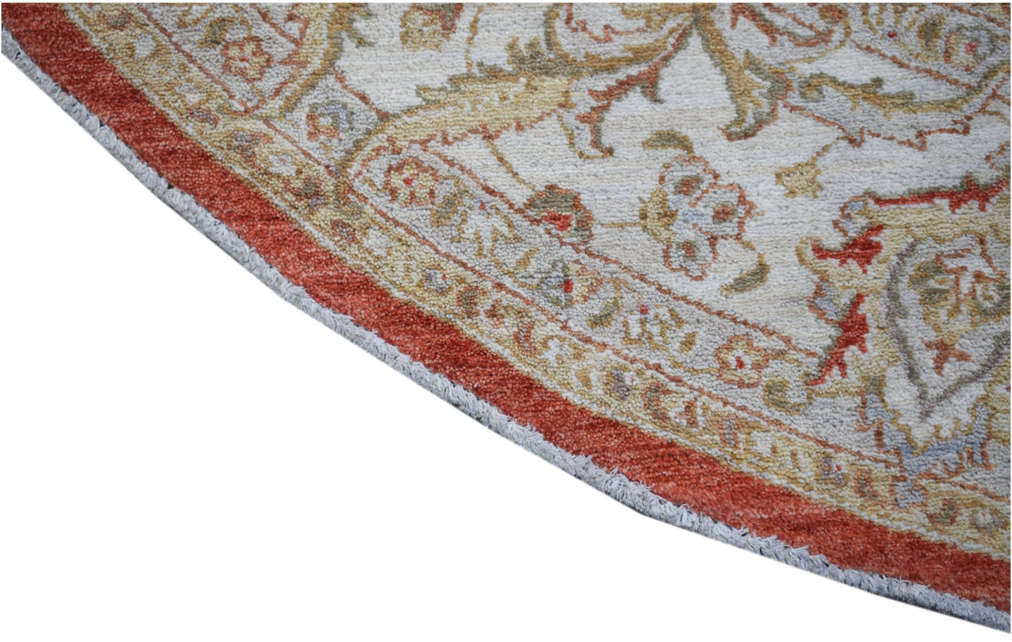 A round Afghan Chobi rug featuring intricate floral patterns in earthy tones with a red border.