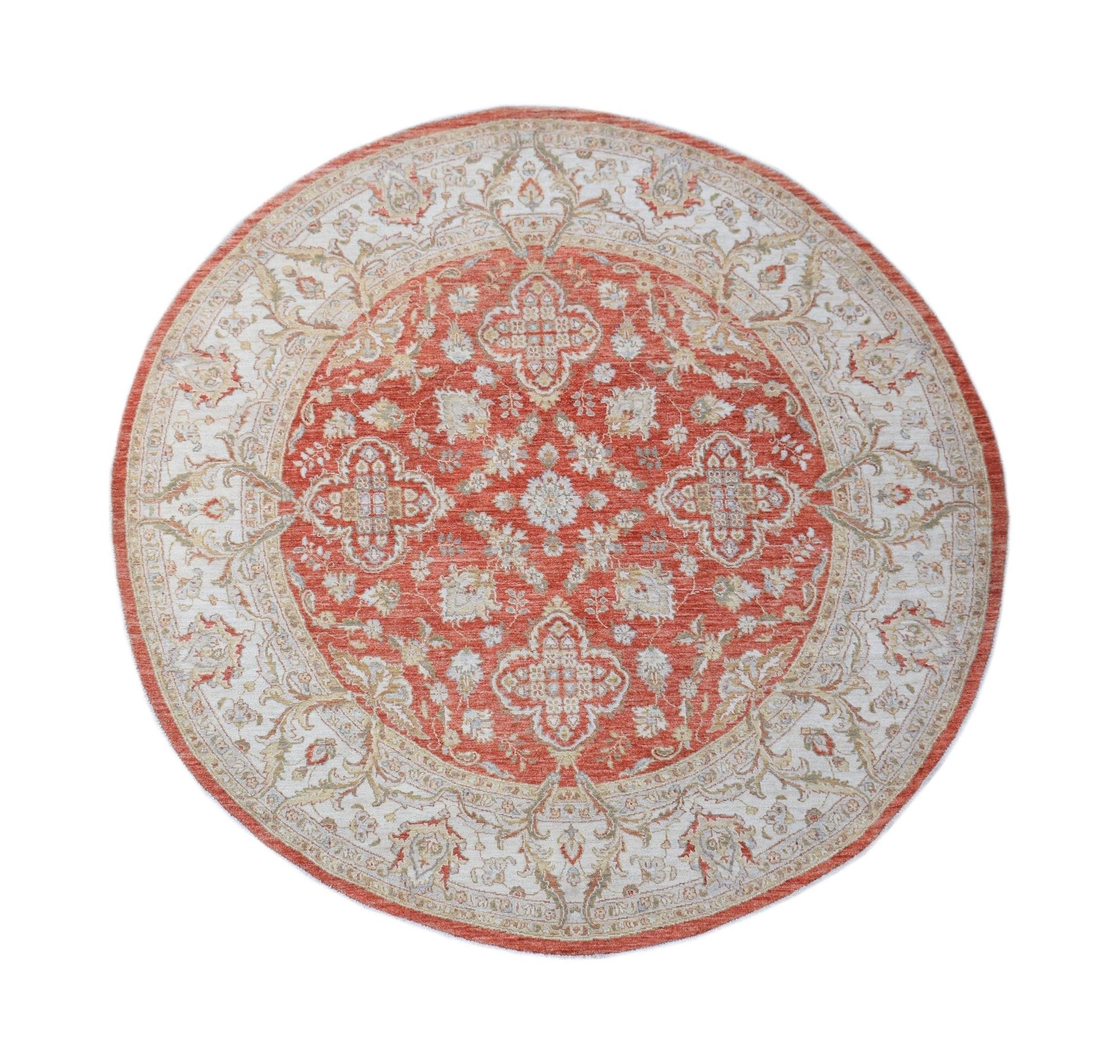 A round Afghan Chobi rug featuring a traditional floral pattern in shades of terracotta and cream.