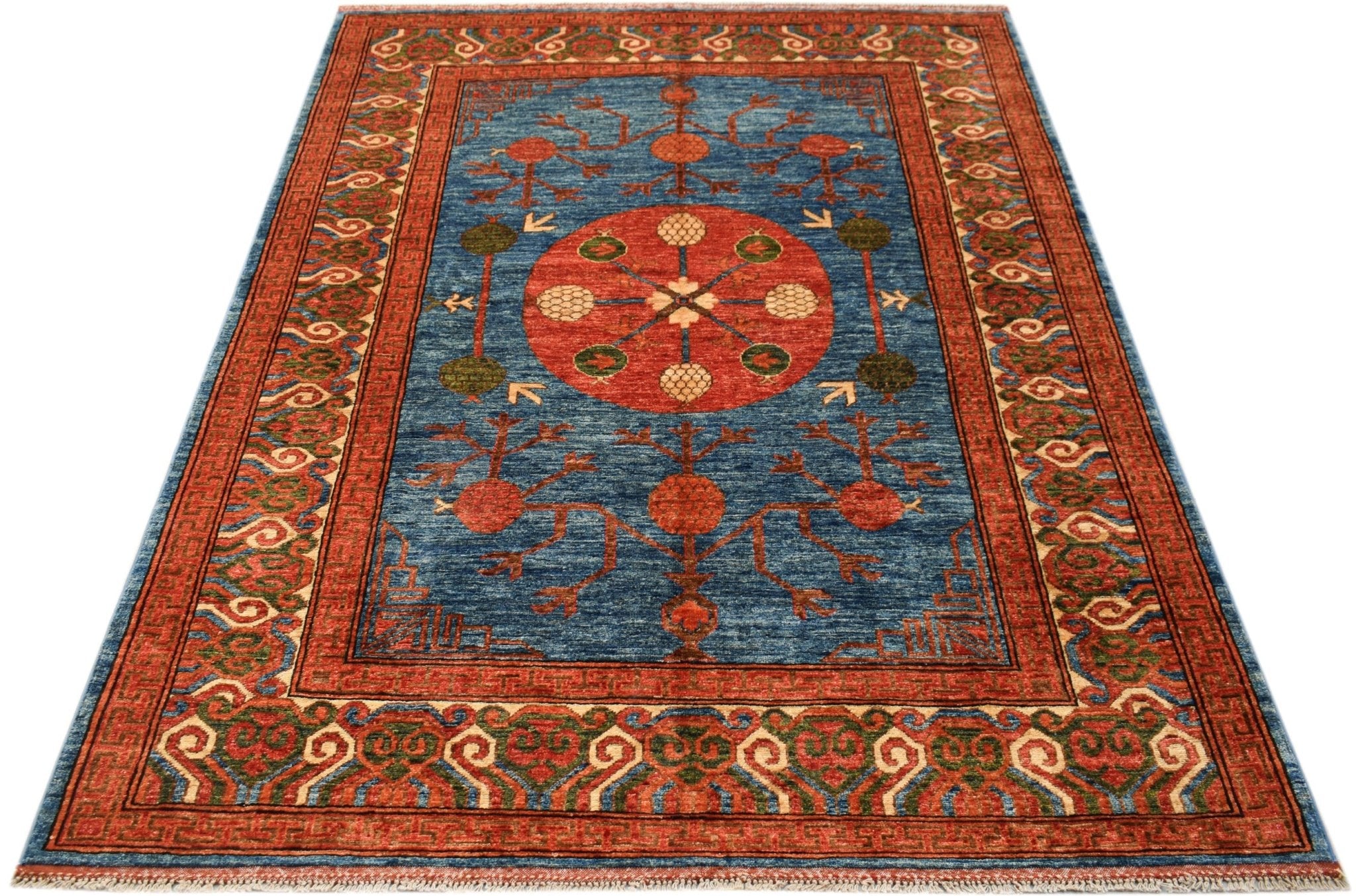 A rectangular Afghan Chobi rug featuring a central red medallion on a blue field with floral motifs.