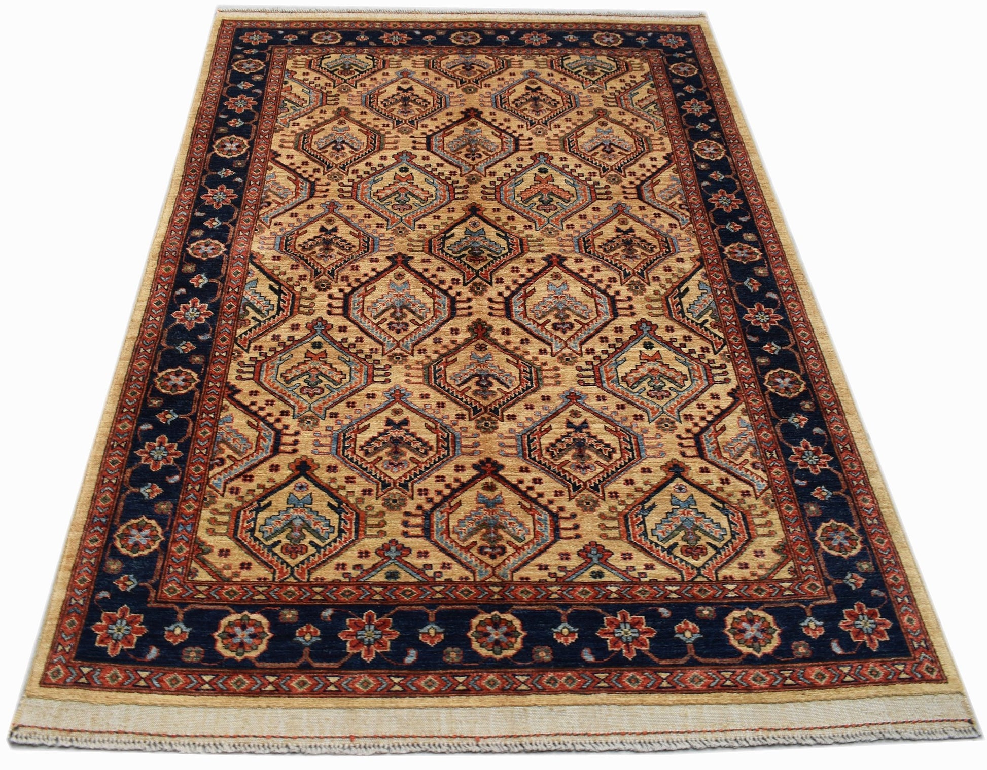 Handwoven Afghan Chobi rug featuring a geometric diamond pattern in earthy tones on a blue border.
