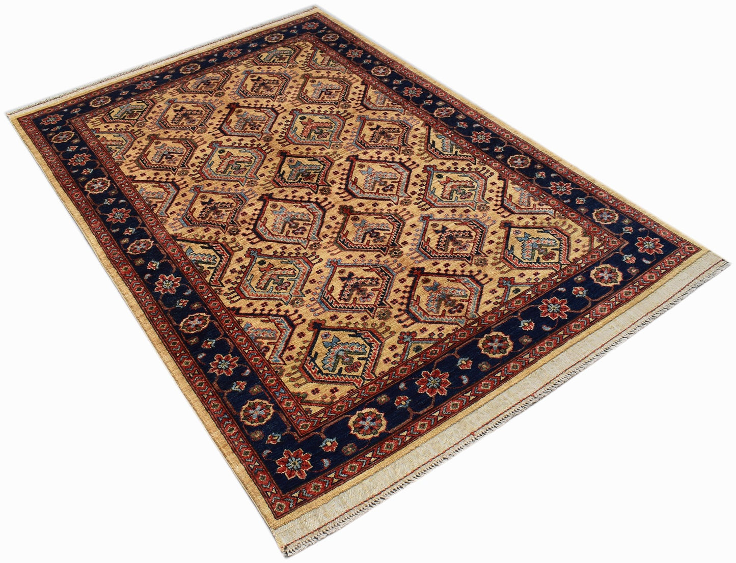 An Afghan Chobi rug featuring a geometric pattern in earthy tones with a dark blue border.