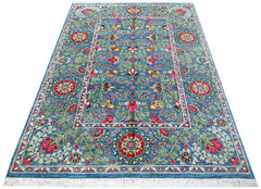 A rectangular Afghan Chobi rug featuring intricate floral patterns in red and blue tones.