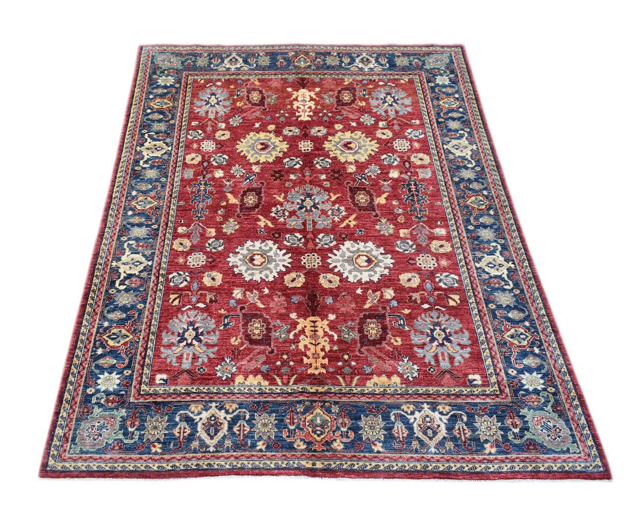 A rectangular Afghan Chobi rug featuring a traditional floral pattern in red, blue, and cream.