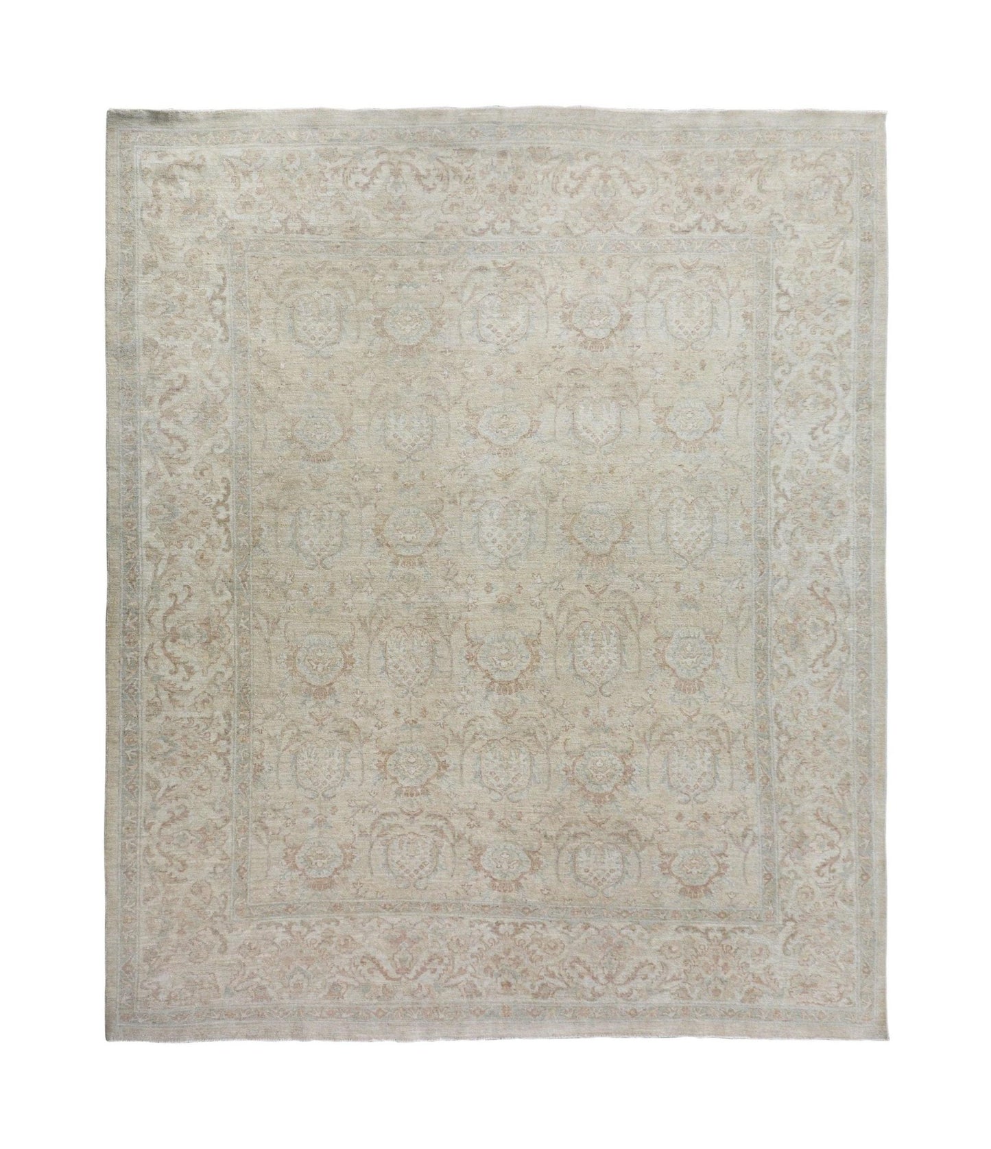A handmade Afghan Chobi rug featuring a traditional floral pattern in soft beige and wood tones.