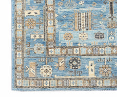 A handmade Afghan Chobi rug featuring intricate geometric patterns in shades of blue and tan.