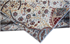 A handwoven Afghan Chobi rug featuring a traditional floral pattern in soft, earthy tones.