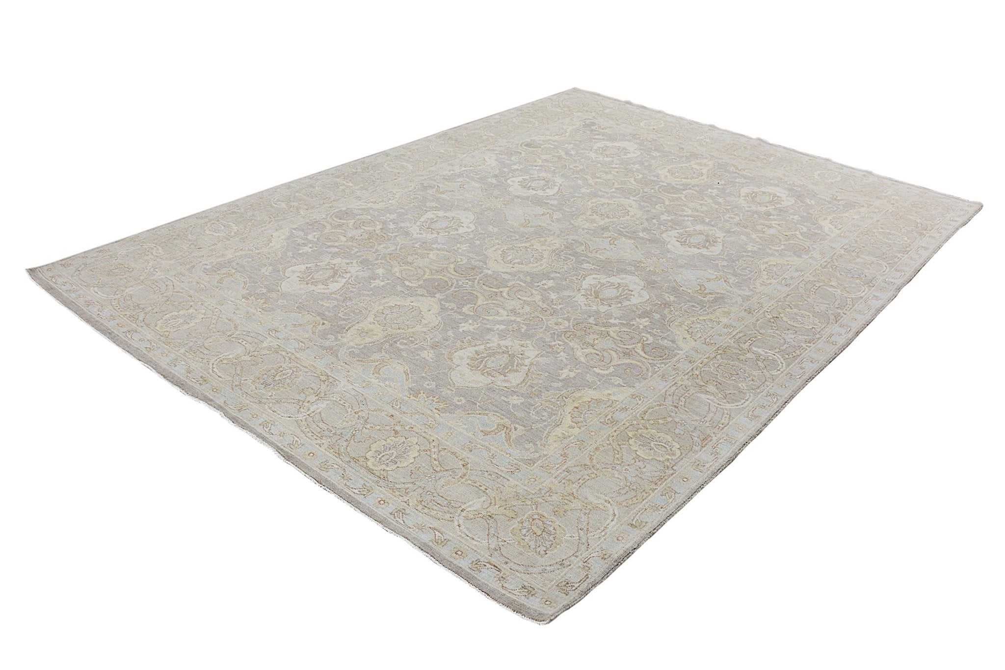A handmade Afghan Chobi rug featuring a traditional floral pattern in neutral beige and grey tones.