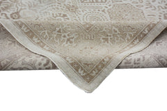 A handmade Afghan Chobi rug featuring a traditional beige and brown patterned design.