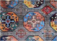 Handmade Afghan Chobi rug featuring a geometric pattern of colorful octagons on a gray background.