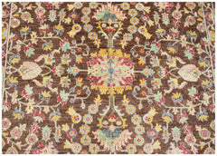 Handwoven Afghan Chobi rug featuring a traditional floral pattern in earthy tones on a brown base.