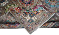 A handwoven Afghan Chobi rug featuring a traditional geometric pattern in vibrant, earthy tones.