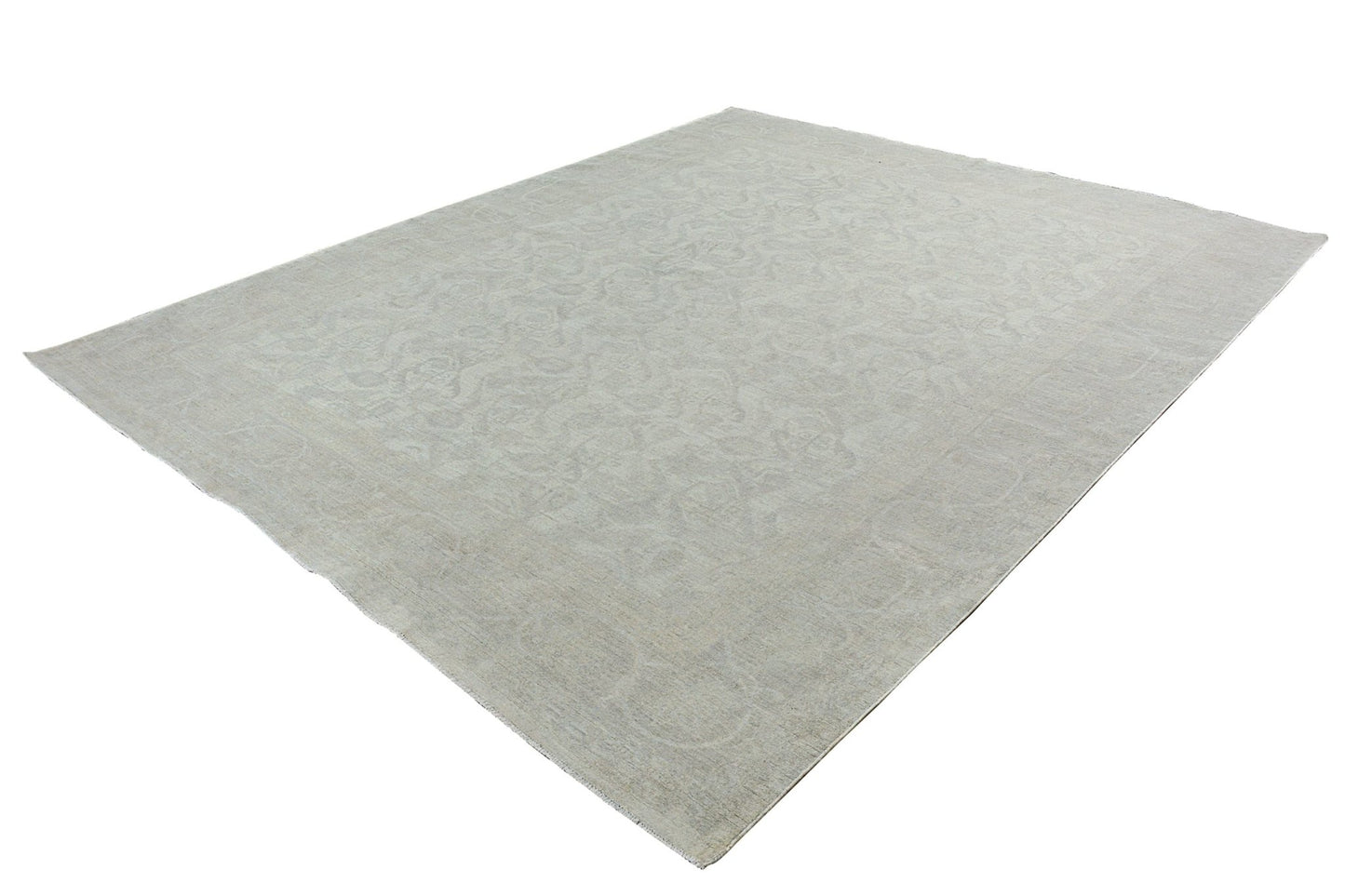 A handmade Afghan Chobi rug featuring a subtle, light-toned traditional pattern.