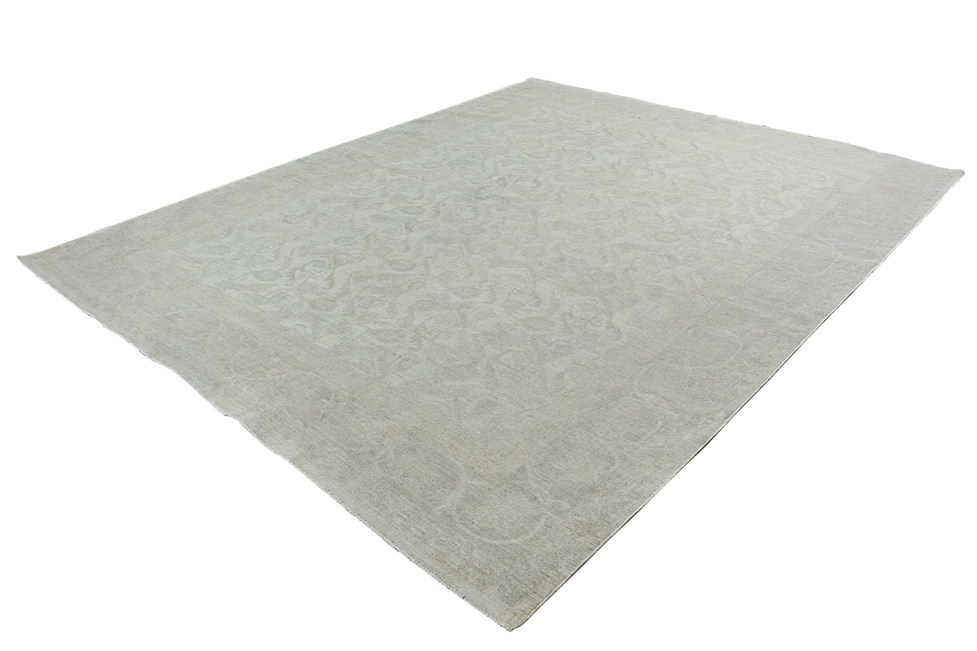 A handmade Afghan Chobi rug featuring a subtle, light-toned traditional pattern.