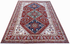 A rectangular Afghan Chobi rug featuring a traditional floral pattern in red, blue, and cream.