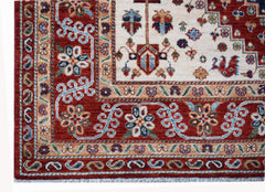 A handmade Afghan Chobi rug featuring a traditional floral pattern in red, cream, and blue tones.