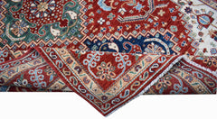 A handwoven Afghan Chobi rug featuring a traditional floral pattern in red, blue, and cream tones.