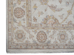 A handwoven Afghan Chobi rug featuring a traditional floral pattern in soft, earthy wood tones.