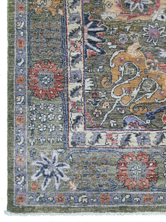 A handwoven Afghan Chobi rug featuring intricate floral patterns in earthy tones on a green field.