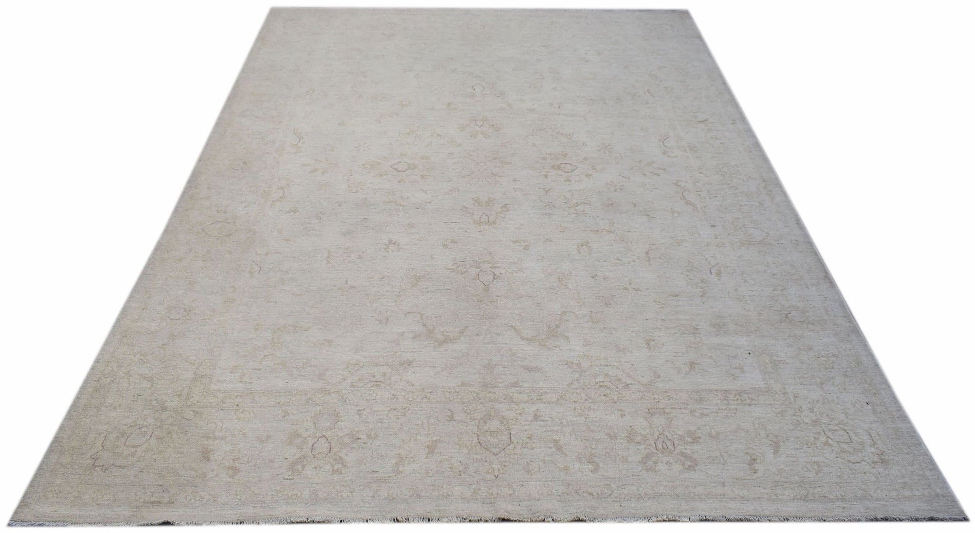 A rectangular Afghan Chobi rug featuring a subtle, light-toned floral pattern on a wool pile.