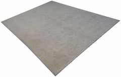 A rectangular Afghan Chobi rug featuring a subtle, light-toned floral pattern on wool.
