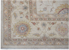 A handmade Afghan Chobi rug featuring a traditional floral pattern in soft, earthy tones.