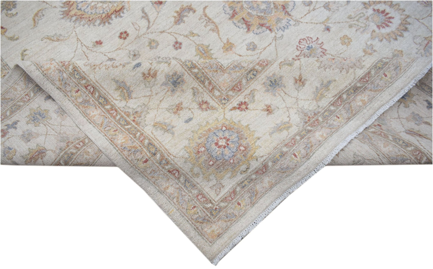 A handwoven Afghan Chobi rug featuring a traditional floral pattern in soft, earthy tones.