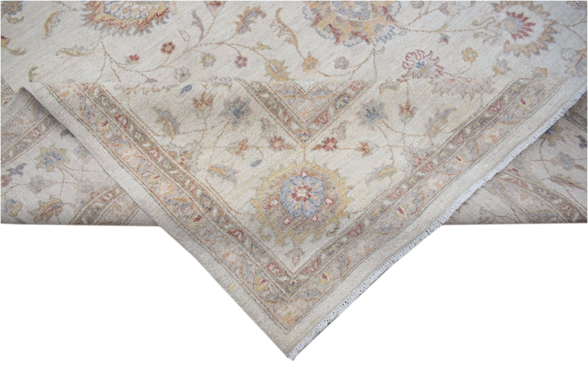 A handwoven Afghan Chobi rug featuring a traditional floral pattern in soft, earthy tones.