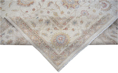 A handwoven Afghan Chobi rug featuring a traditional floral pattern in soft, earthy tones.