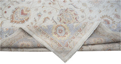 A handwoven Afghan Chobi rug featuring a traditional floral pattern in soft, earthy tones.