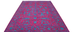 A rectangular Afghan Chobi rug featuring a vibrant magenta background with intricate teal patterns.