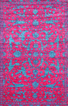 A rectangular Afghan Chobi rug featuring a vibrant magenta field with intricate teal floral motifs.