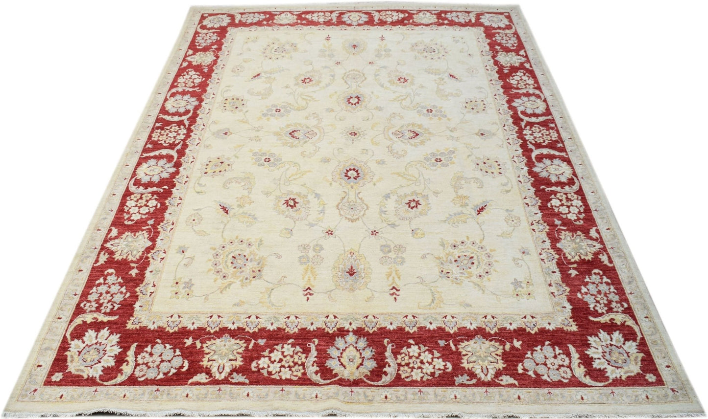 A rectangular Afghan Chobi rug featuring a cream field with floral motifs and a red border.